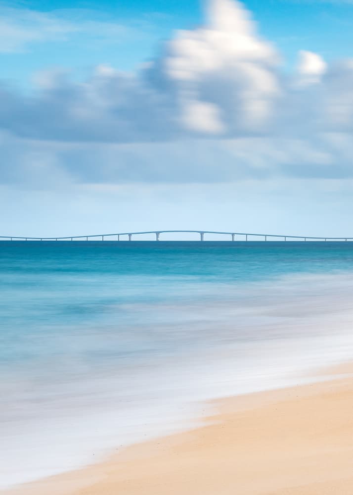 Long Bridge Over Serene Ocean by Hidenori Sono — canvas wall art
