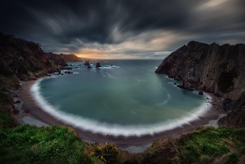 Moody Ocean Cove by Alberto Alvaro — canvas wall art