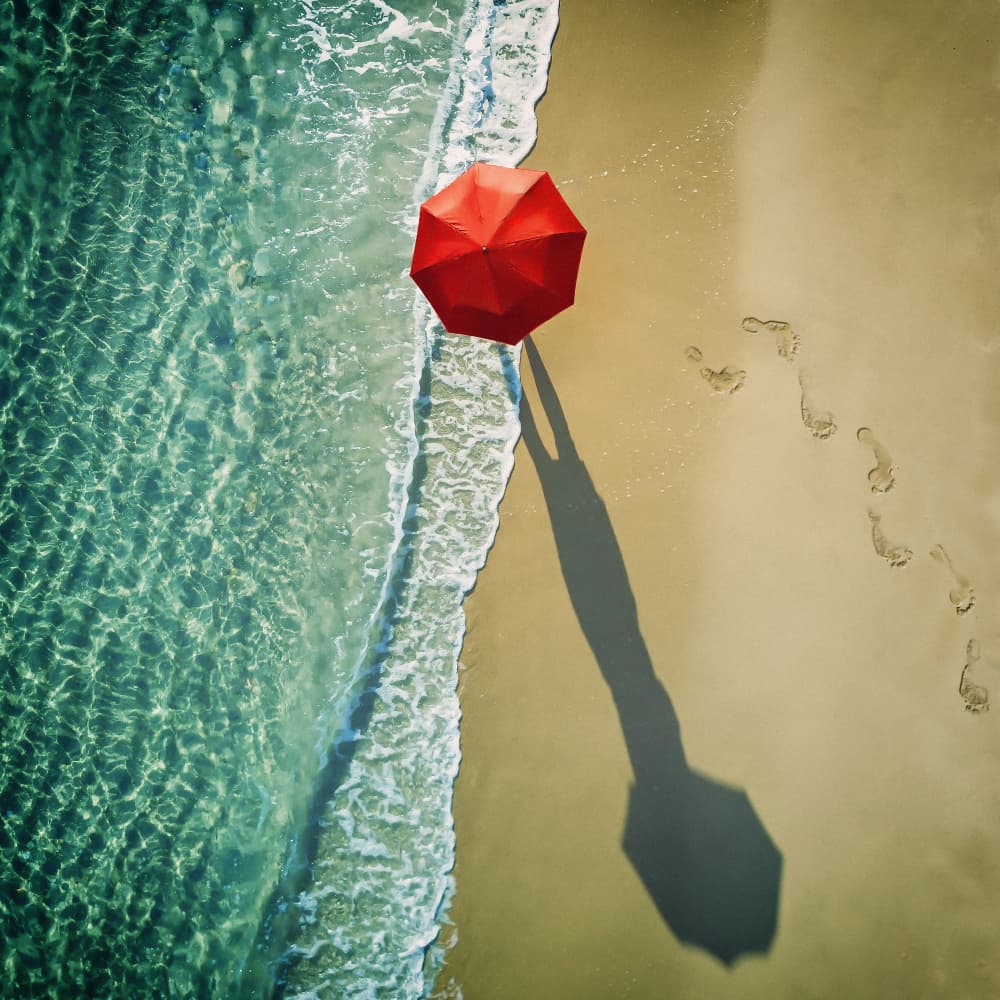 Red Umbrella Beach Walk by ambra — canvas wall art