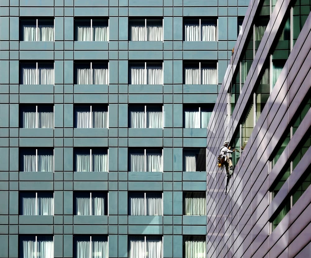Skyscraper Window Cleaner by Anna Niemiec — canvas wall art