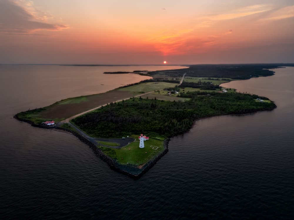 Coastal Lighthouse Sunset by Ambar Saha — canvas wall art