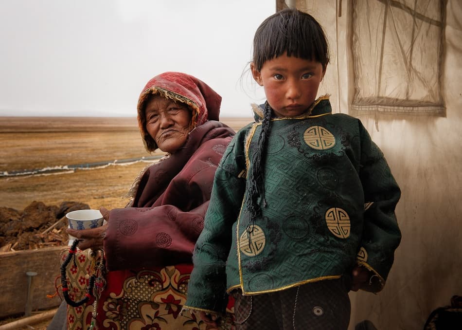 Tibetan Elder and Child by Nicolas Marino — canvas wall art