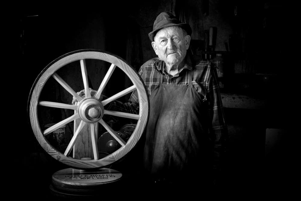 Master Craftsman and Wheel by Bojan Kolman — canvas wall art