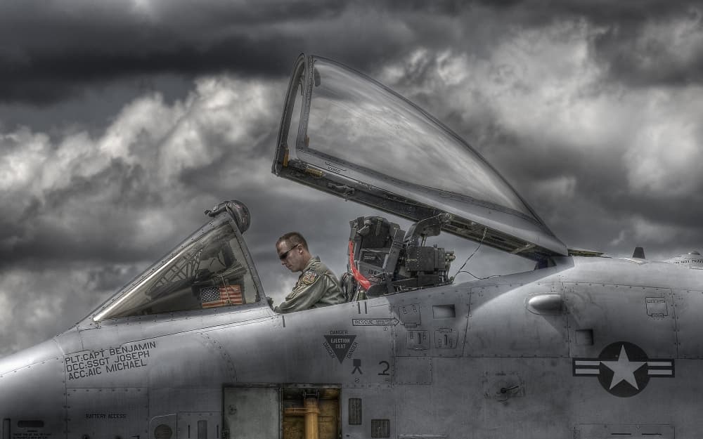 Fighter Pilot Under Storm Clouds by Leon — canvas wall art