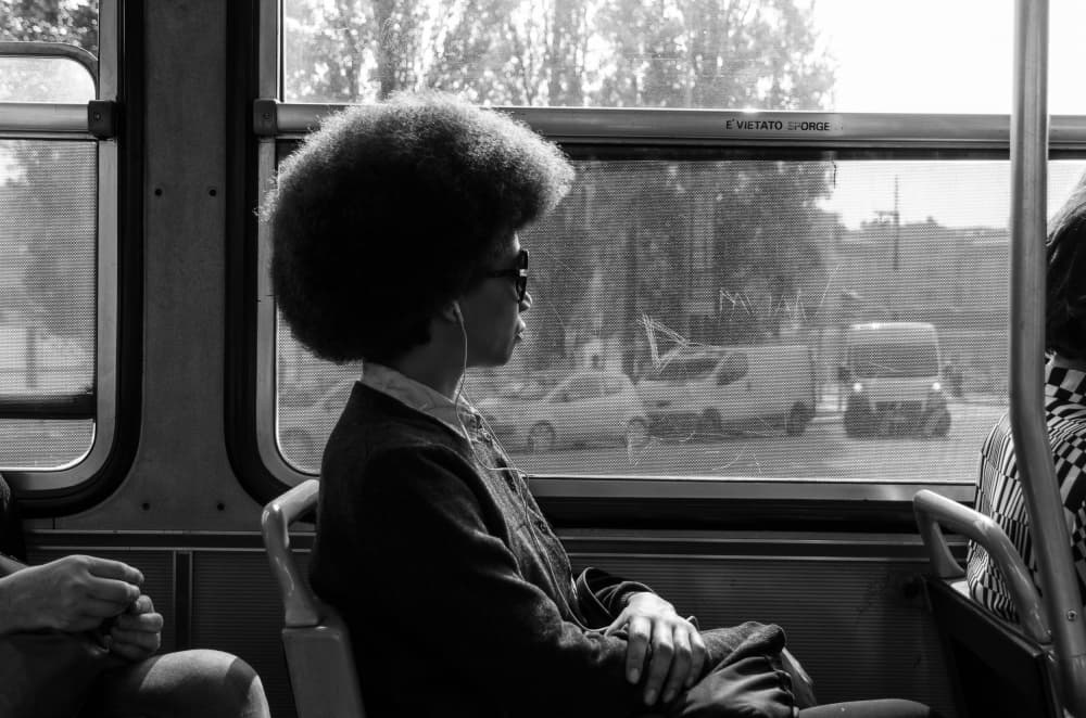 Afro Bus Commute by Carlo Tonti — canvas wall art