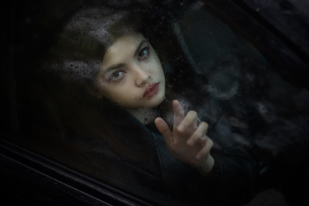 Young Woman's Rainy Gaze by Arsen Alaberdov — canvas wall art