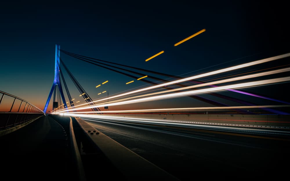 Dynamic Night Bridge Trails by Jörg Vollrath — canvas wall art