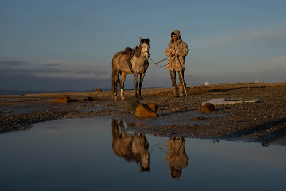 Man Horse Sunset Reflection by Mustafa Sahin — canvas wall art
