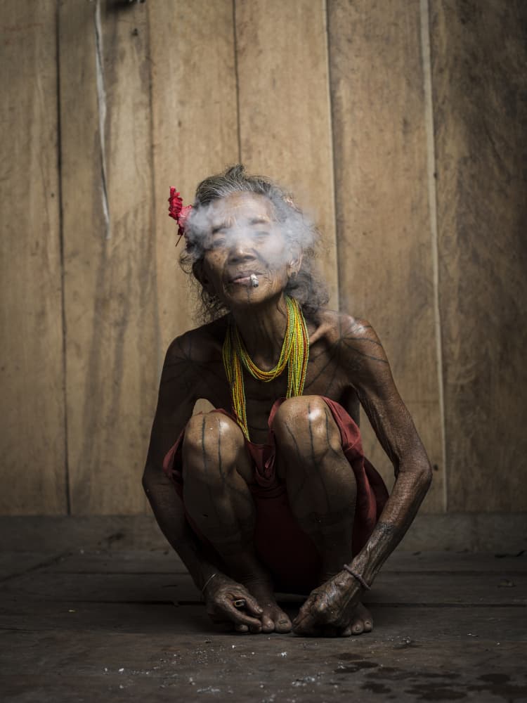 Traditional Elder Smoking by Matt Jacob — canvas wall art