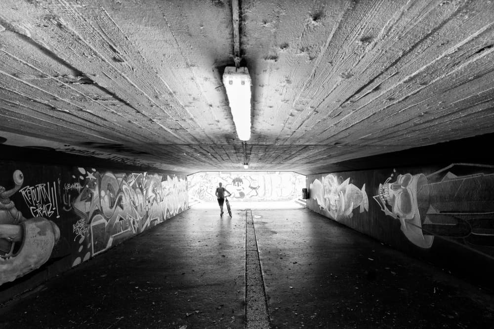 Skateboarder in Tunnel Light by Jurij Bizjak — canvas wall art