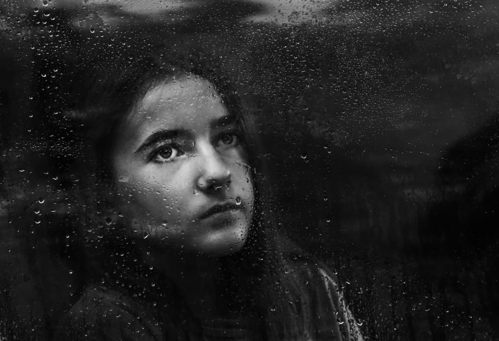 Thoughtful Girl Rainy Window by Ummu Nisan Kandilcioglu — canvas wall art