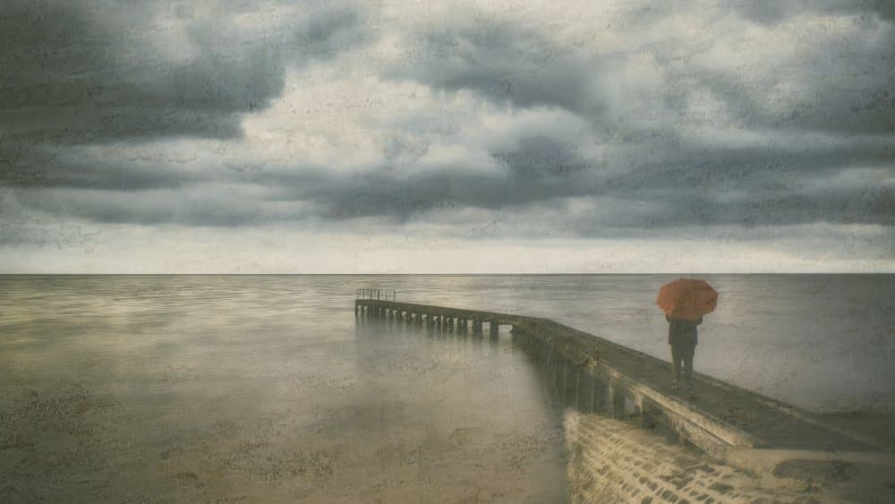 Orange Umbrella on Pier by Stéphane Pecqueux — canvas wall art