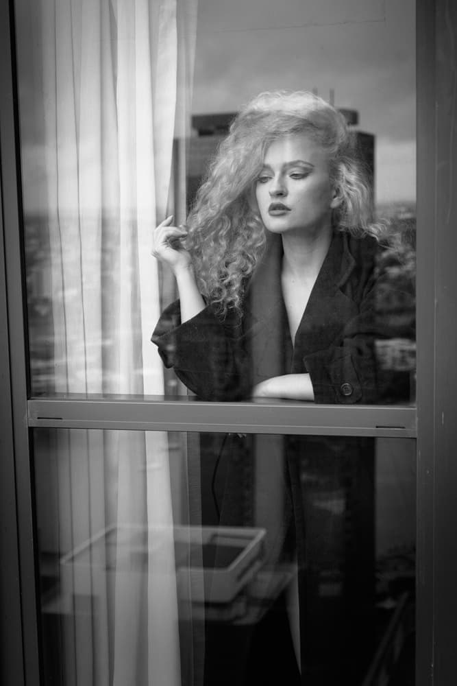 Pensive City Window by Mel Brackstone — canvas wall art