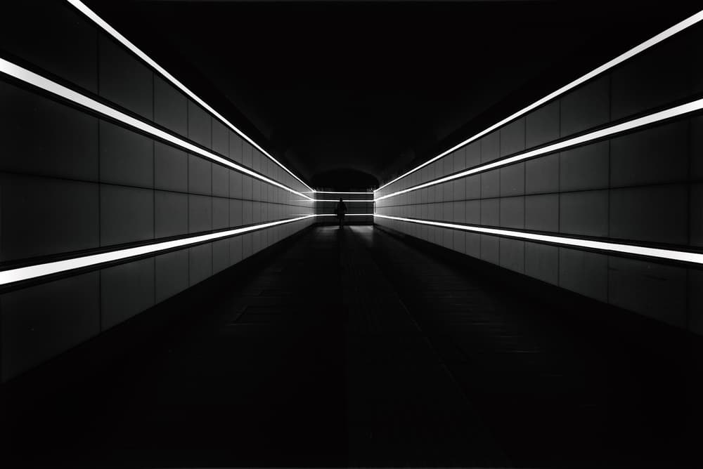 Dark Tunnel Solitary Figure by Gaia Rampon — canvas wall art