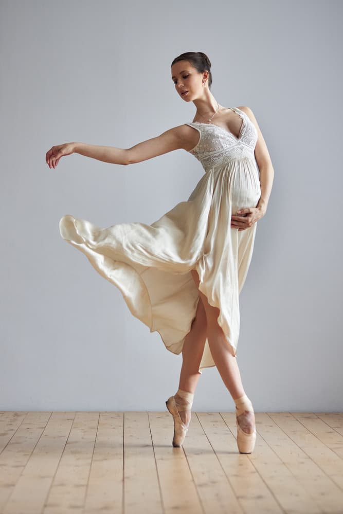 Graceful Maternity Dance by Photographer — canvas wall art