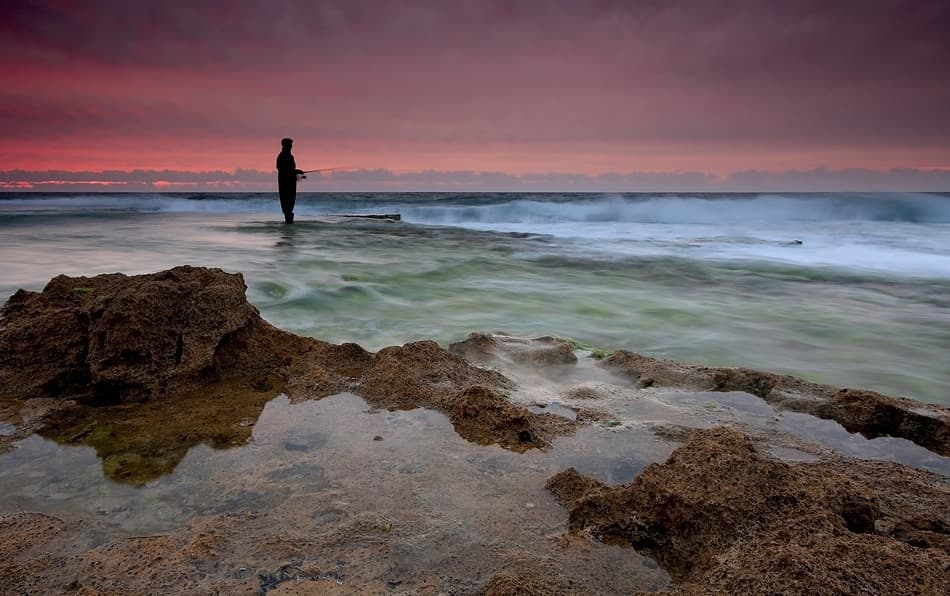 Dramatic Sunset Fishing by Amnon Eichelberg — canvas wall art