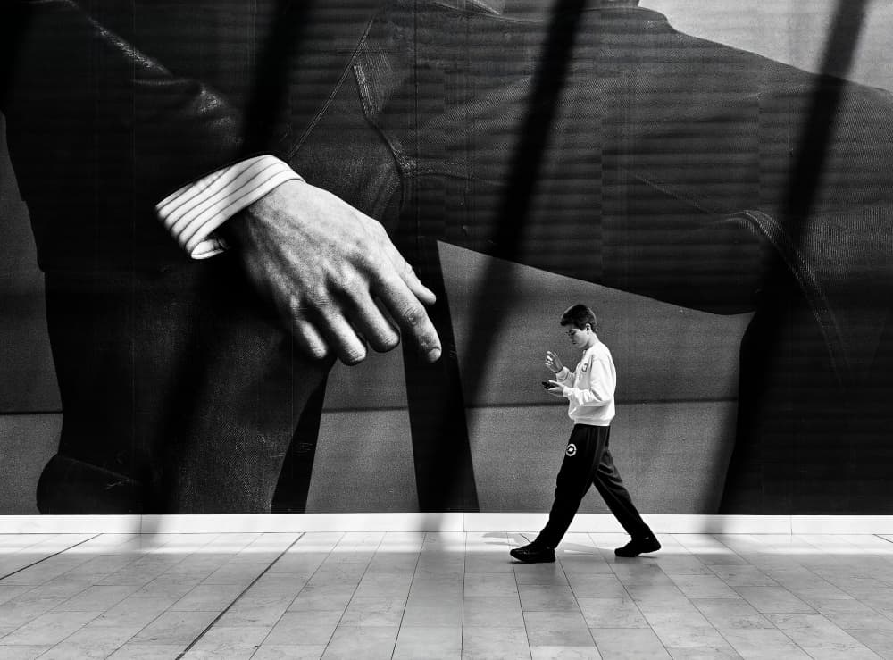 Man And Giant Hand by Jasmine Zhang — canvas wall art