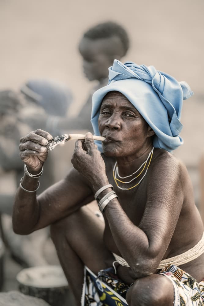 African Woman Smoking Pipe by Trevor Cole — canvas wall art