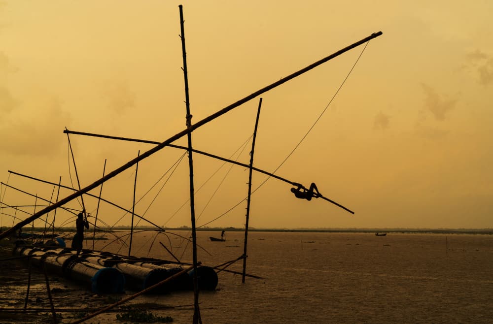 Golden Hour Fishermen by Md. Arifuzzaman — canvas wall art