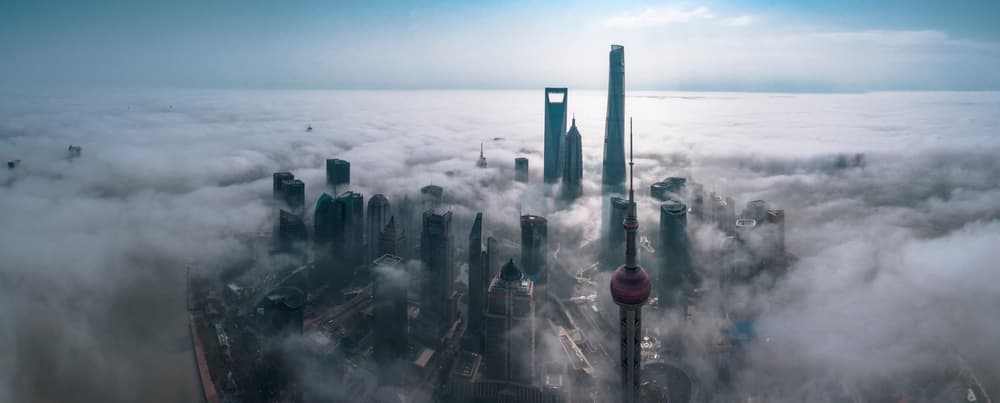 Shanghai City Above Clouds by Stan Huang — canvas wall art