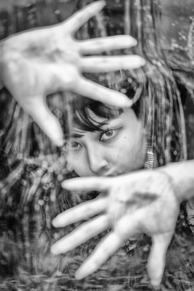 Woman Behind Hands by Masatoshi Washimi — canvas wall art