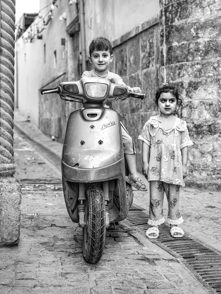 Smiling Street Kids by Bashar Alsofey — canvas wall art