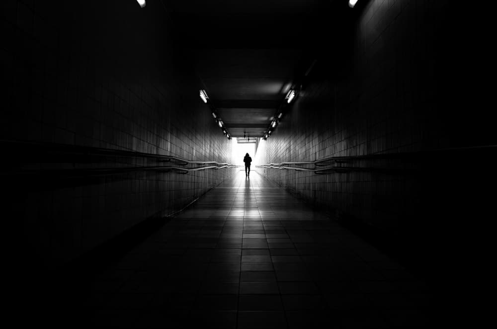 Man Walking Towards Light by Jorge Pimenta — canvas wall art