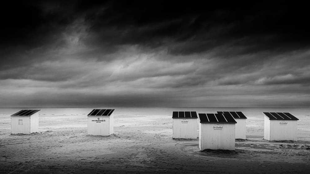 Beach Huts Under Gloomy Sky by Bruno Flour — canvas wall art