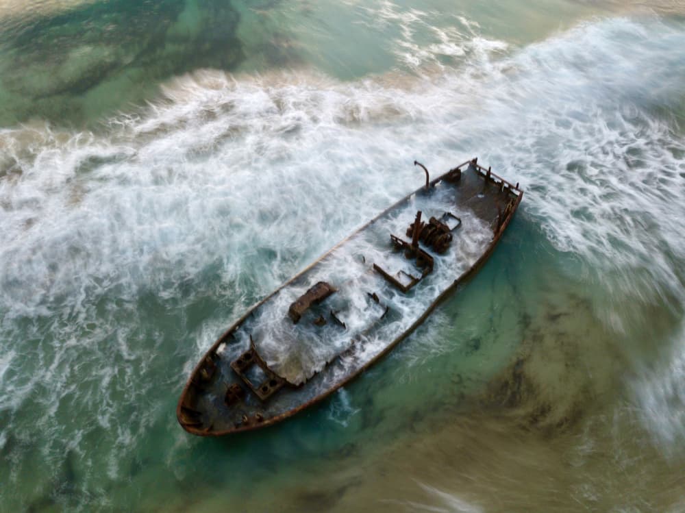 Shipwrecked Coastal Drama by eMunther — canvas wall art