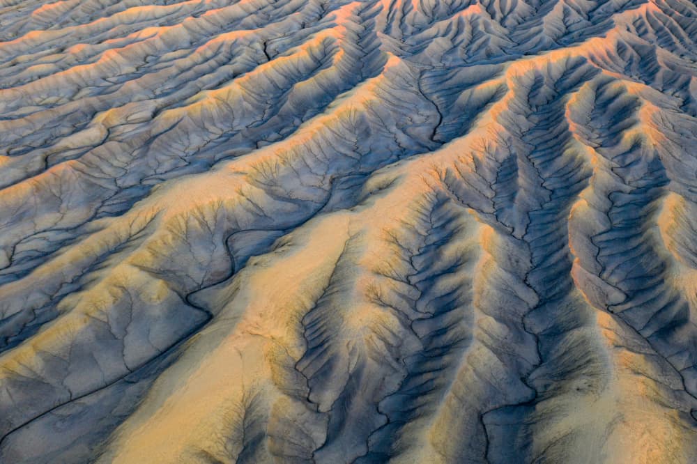 Golden Blue Badlands by Gerald Macua — canvas wall art