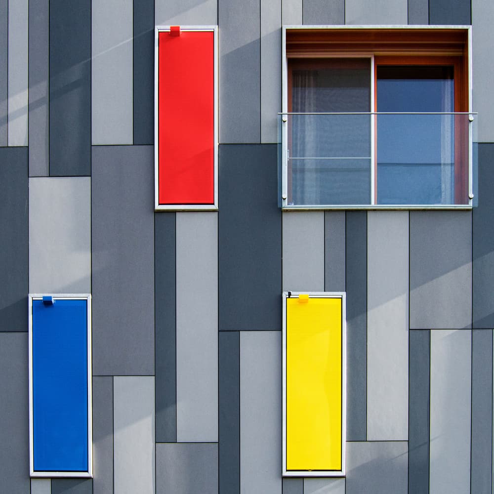 Vibrant Geometric Facade by Luc Vangindertael (laGrange) — canvas wall art