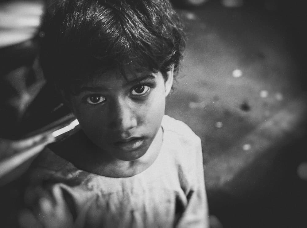 Young Boy's Gaze by Ariel Ariel — canvas wall art