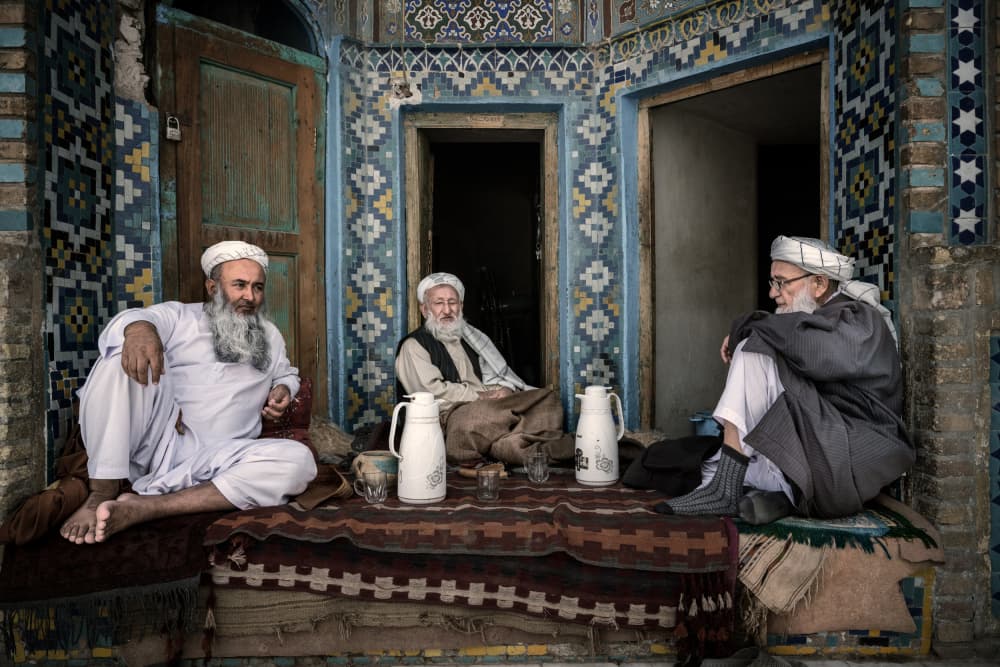 Three Men's Tea Time by Trevor Cole — canvas wall art