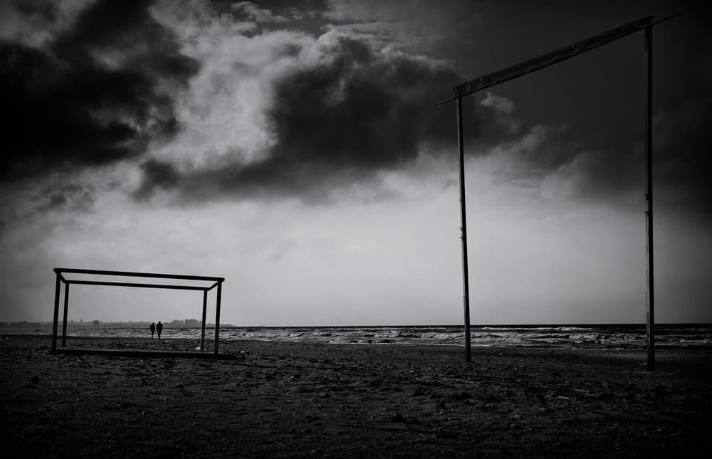 Moody Beach Frames by Elena Raceala — canvas wall art