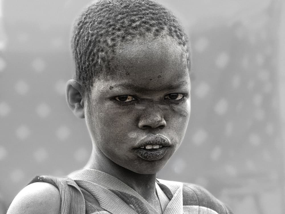 Intense Child Gaze by Elena Molina — canvas wall art