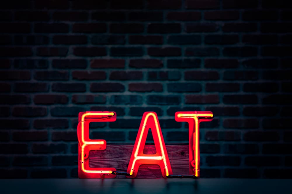 Red Neon Eat Sign by Tim Mossholder — canvas wall art