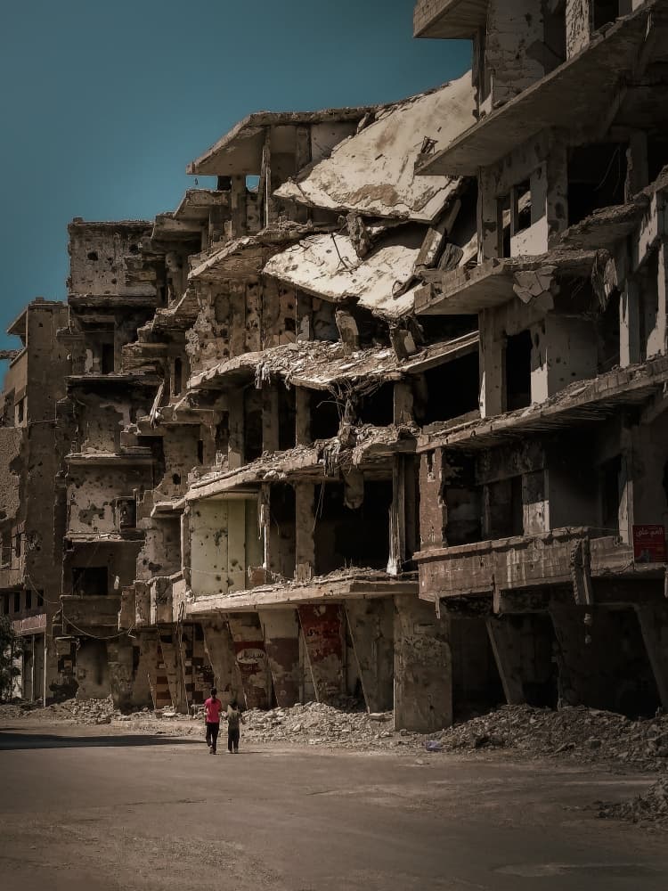 Children in War Ruins by Noureddin Abdulbari — canvas wall art