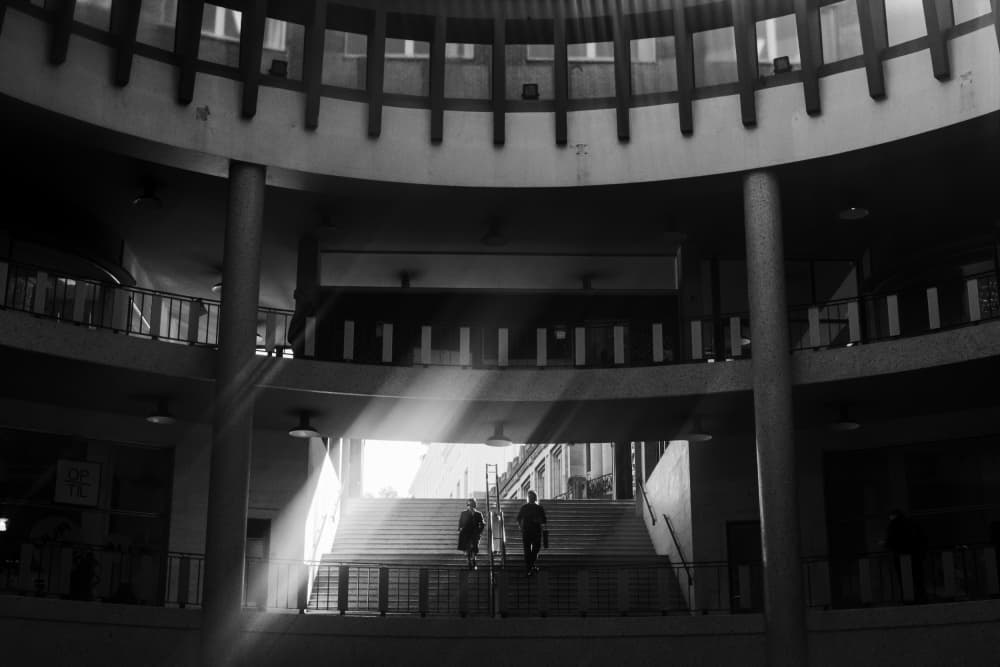 Sunlit Architectural Stairs by Olga Varlakova — canvas wall art