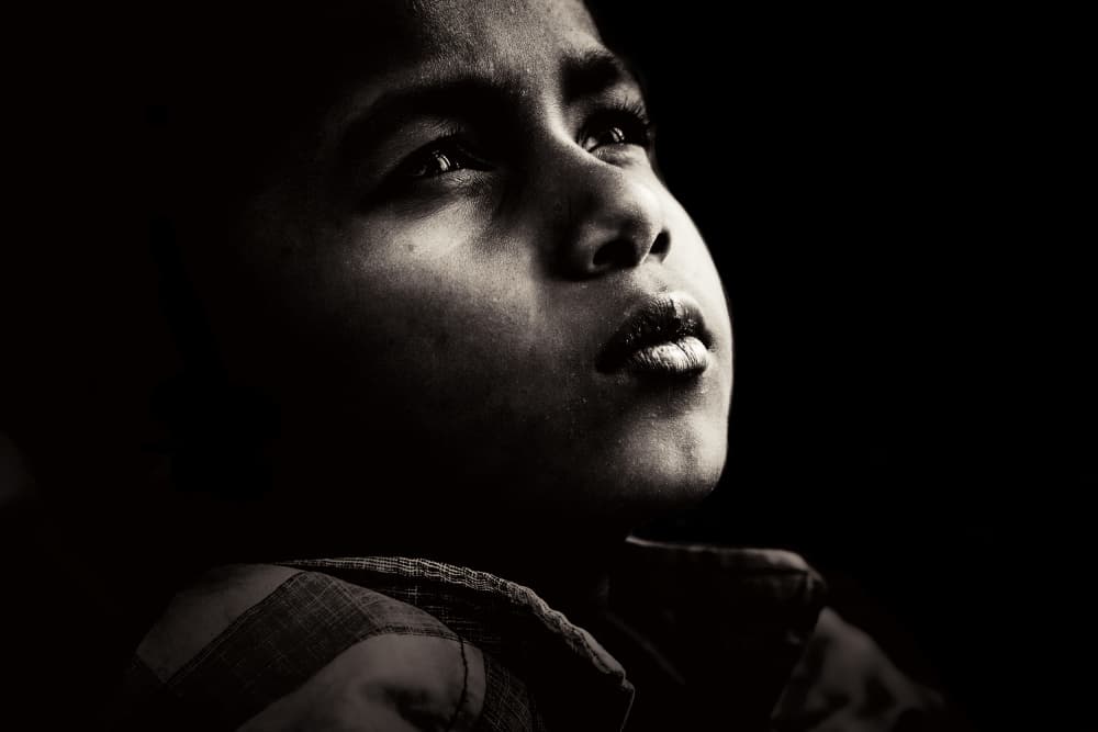 Pensive Young Boy by Gloria Staffa — canvas wall art