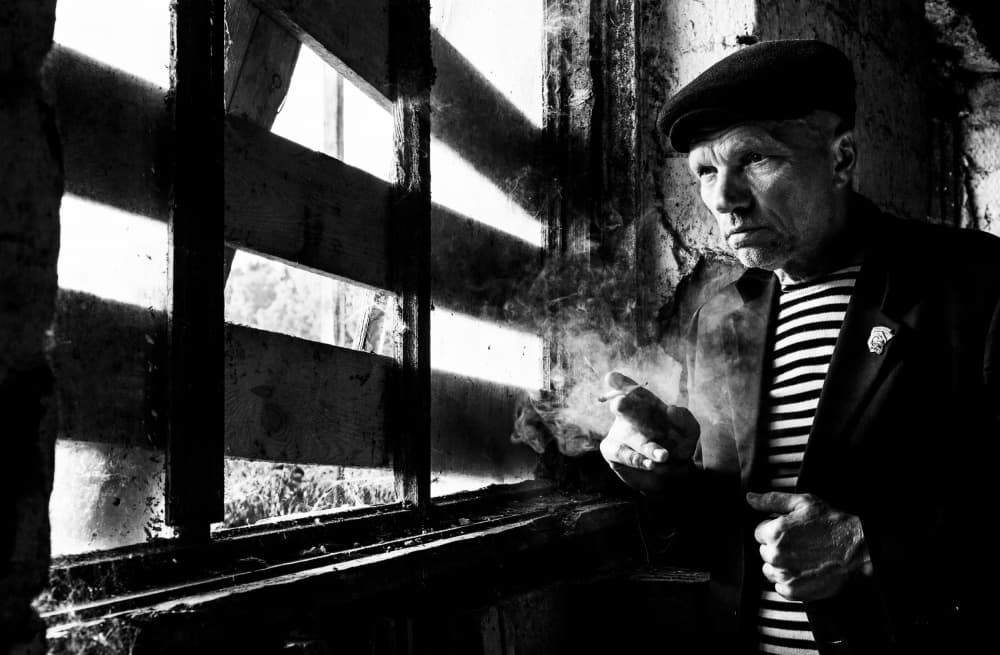 Contemplative Man Smoking by Viktor Cherkasov — canvas wall art