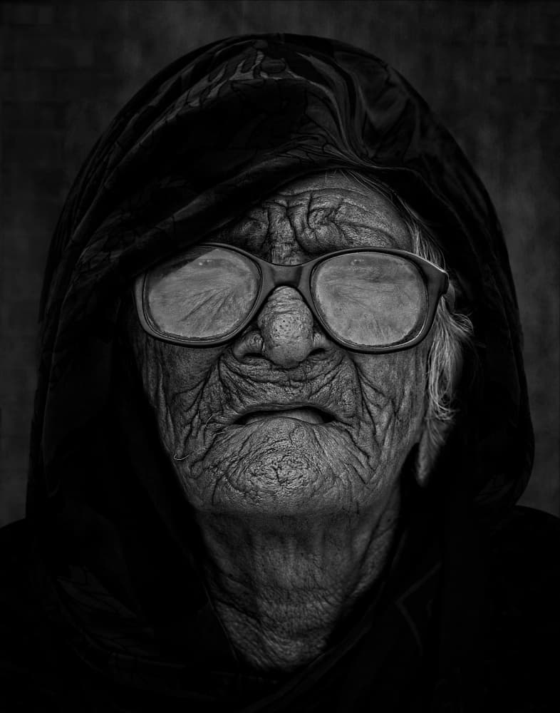 Hooded Elder With Glasses by Sayyed Nayyer Reza — canvas wall art