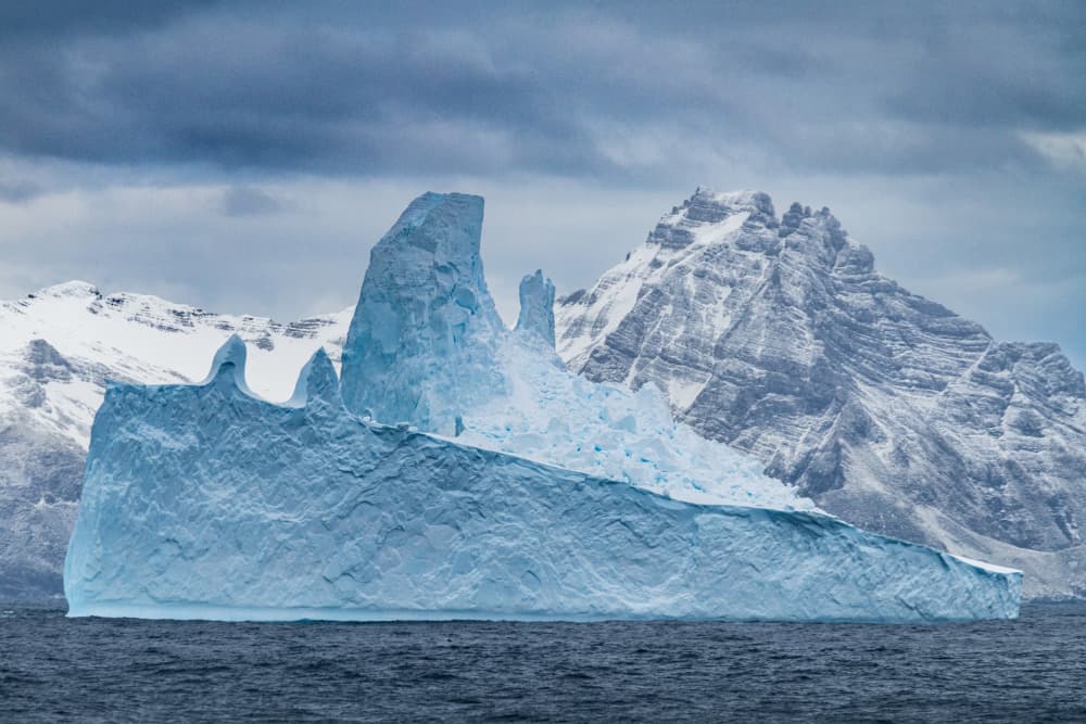 Blue Iceberg And Peaks by Nanda Bussers — canvas wall art