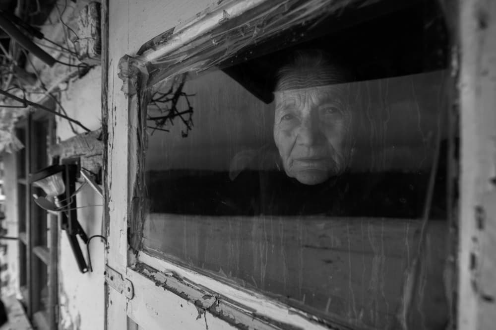 Pensive Woman at Window by Grigore Roibu — canvas wall art