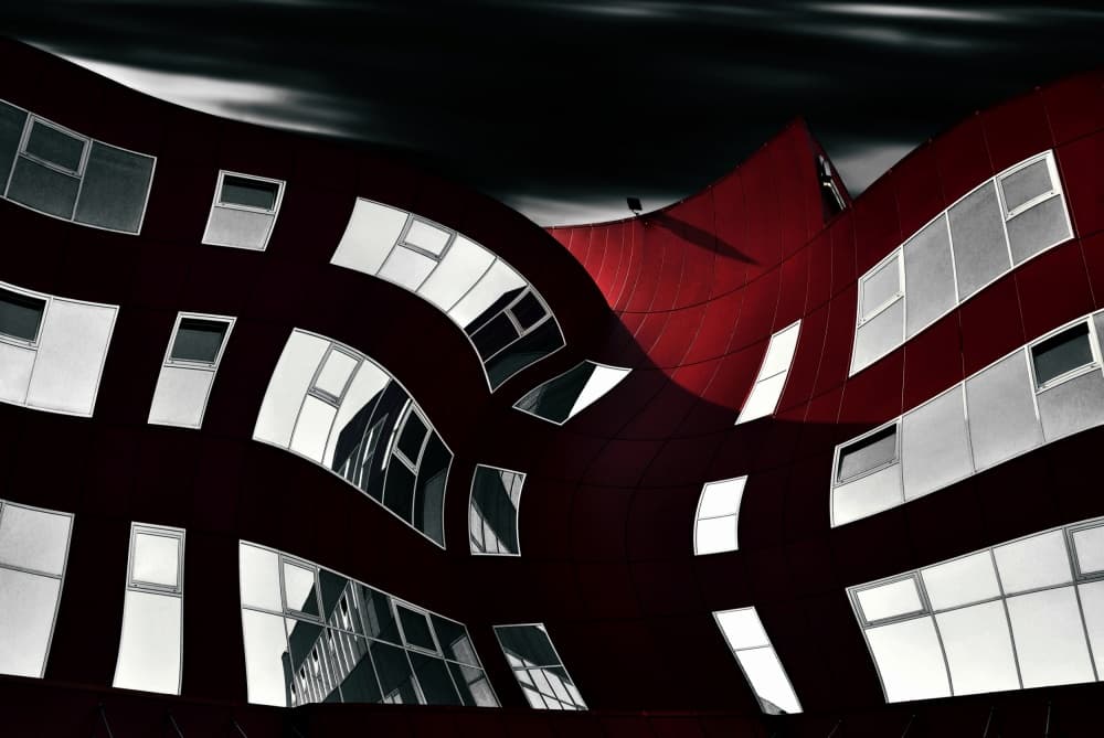 Wavy Red Building by Samanta Krivec — canvas wall art