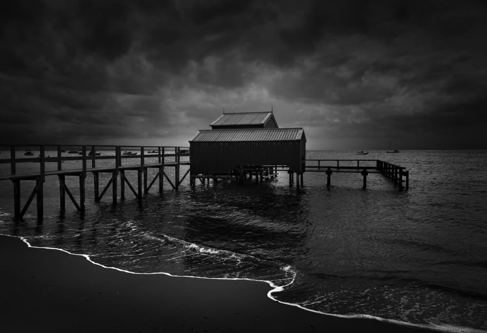 Dark Coastal Boathouse by David Chiodo — canvas wall art