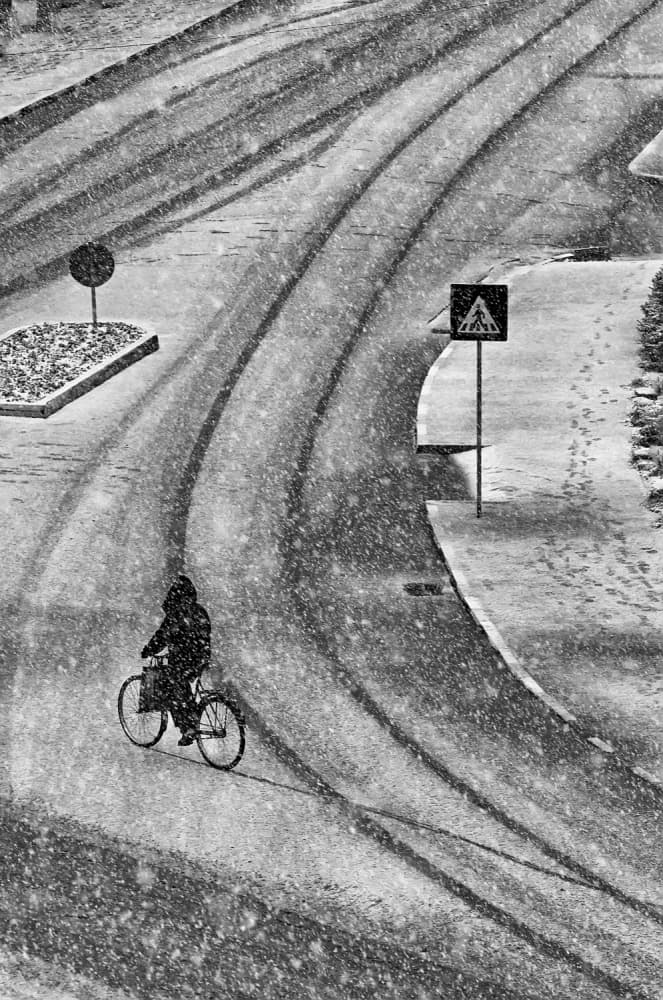 Snowy City Commute by mihai ian nedelcu — canvas wall art