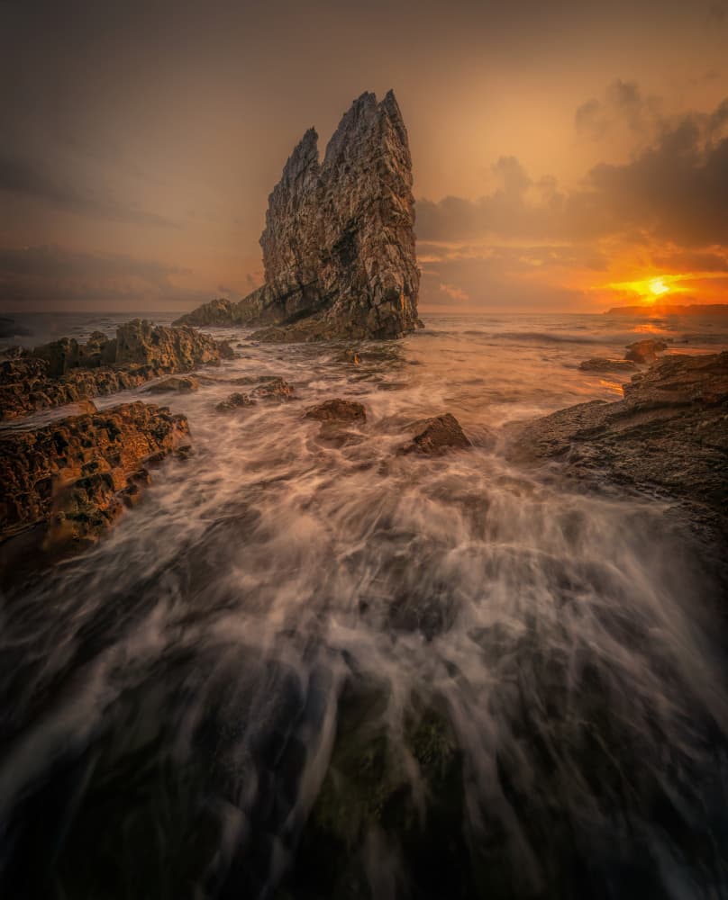 Dramatic Sea Stack Sunset by Yuan Su — canvas wall art