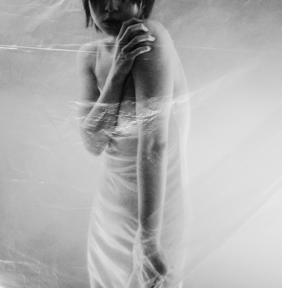 Introspective Woman Wrapped by Mi Young Choi — canvas wall art