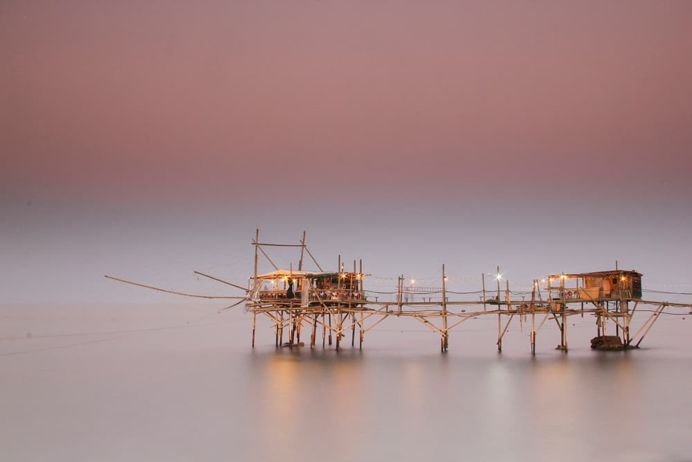 Twilight Stilt Houses by Alessandro Bergamin — canvas wall art