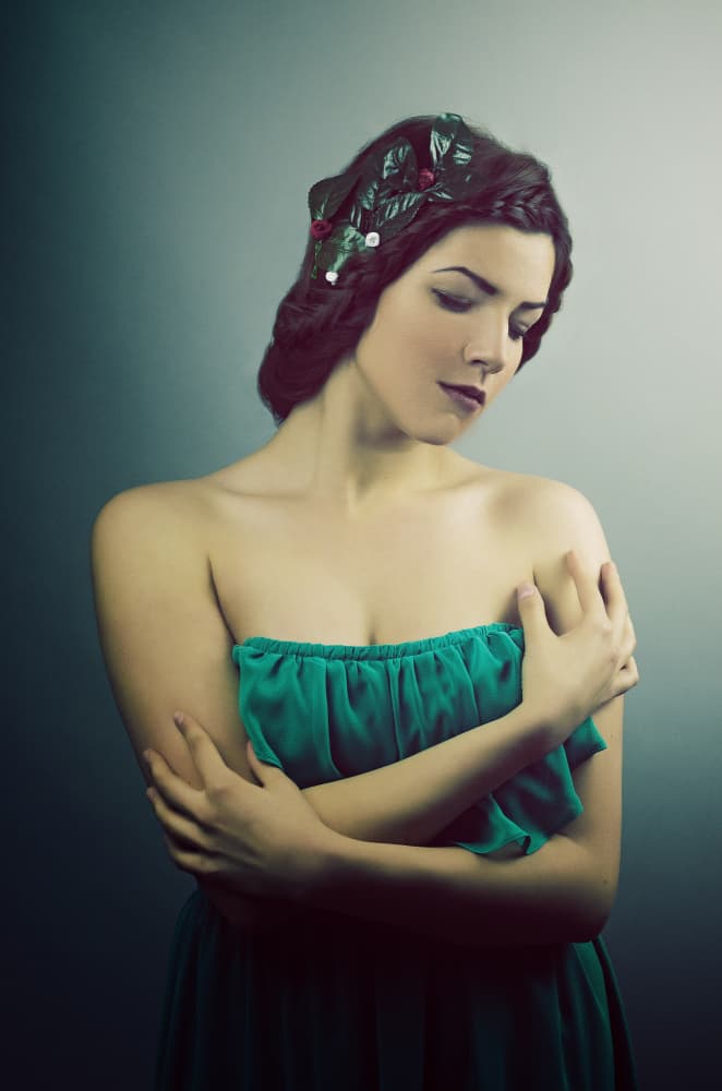 Pensive Woman in Green by Bogdan Negoita — canvas wall art